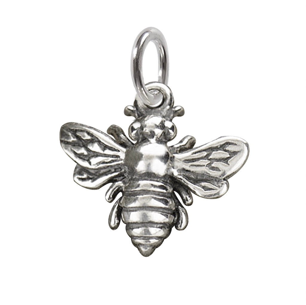 sterling silver bee charm on a white background