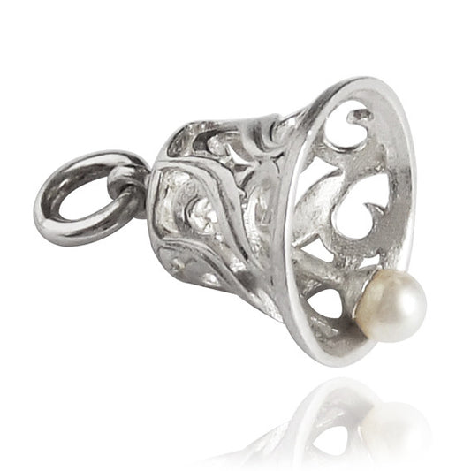 sterling silver bell charm with pearl clapper against a white background 