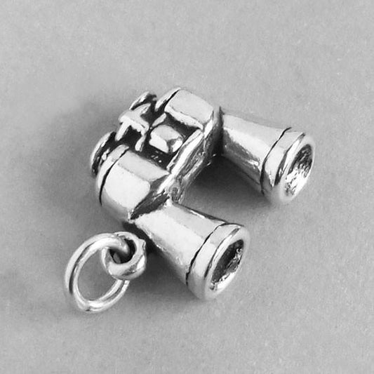 binoculars charm in silver on grey background