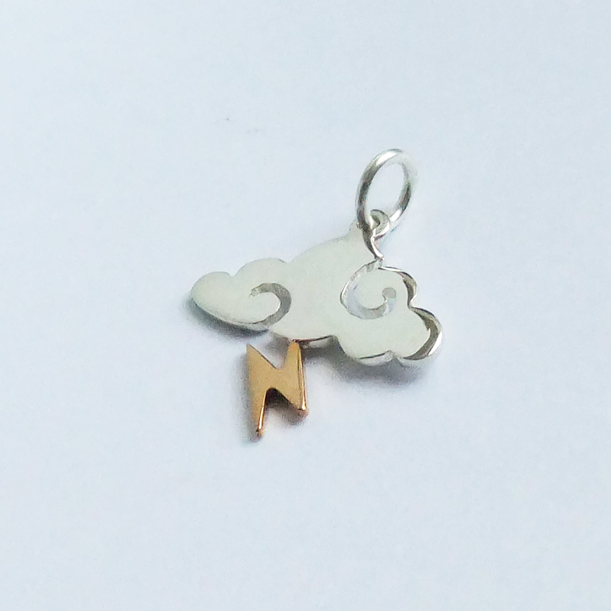 sterling silver and bronze storm cloud charm with lightning