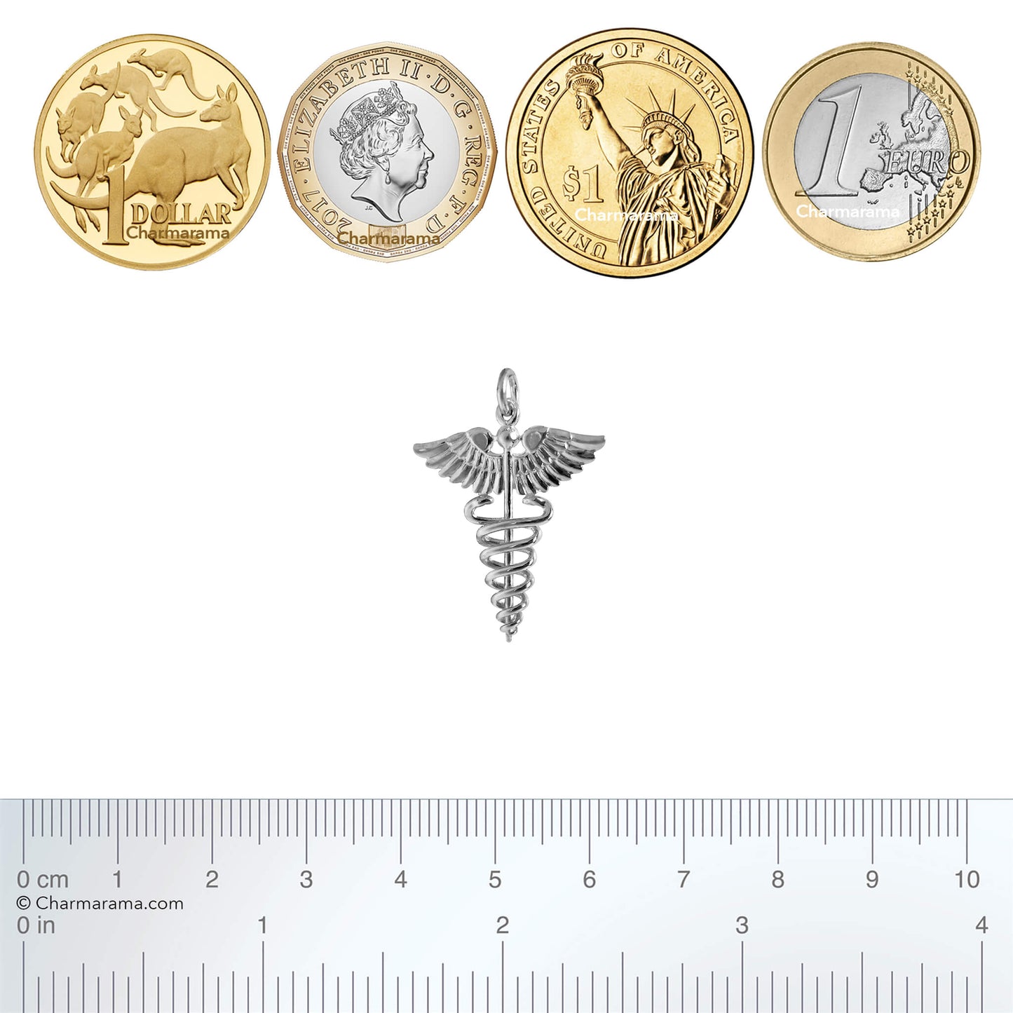 silver caduceus symbol charm with coins and ruler for scale on a white background