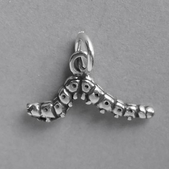 caterpillar pendant on grey background