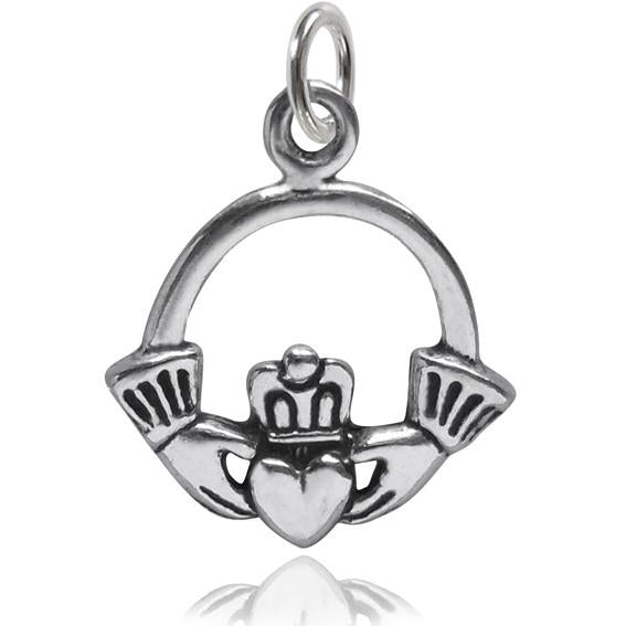 silver Claddagh Irish crowned heart in hands symbol on white background