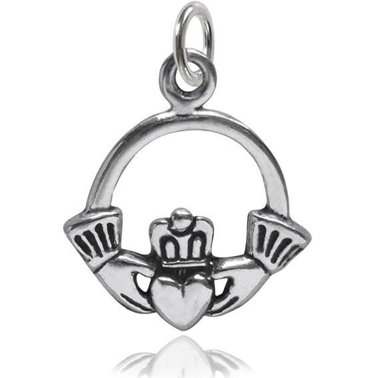 silver Claddagh Irish crowned heart in hands symbol on white background