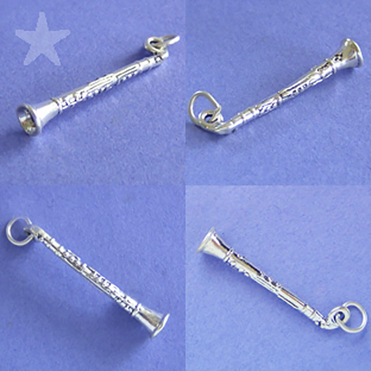 Sterling silver clarinet charm on purple background