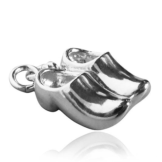 Sterling silver clogs charm on white background