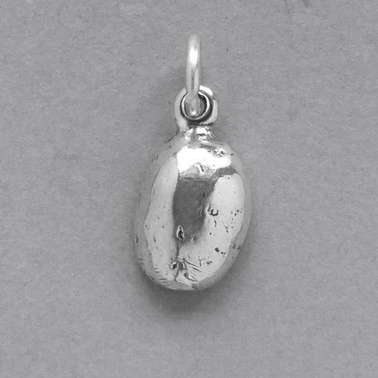 silver coffee bean charm on grey background 