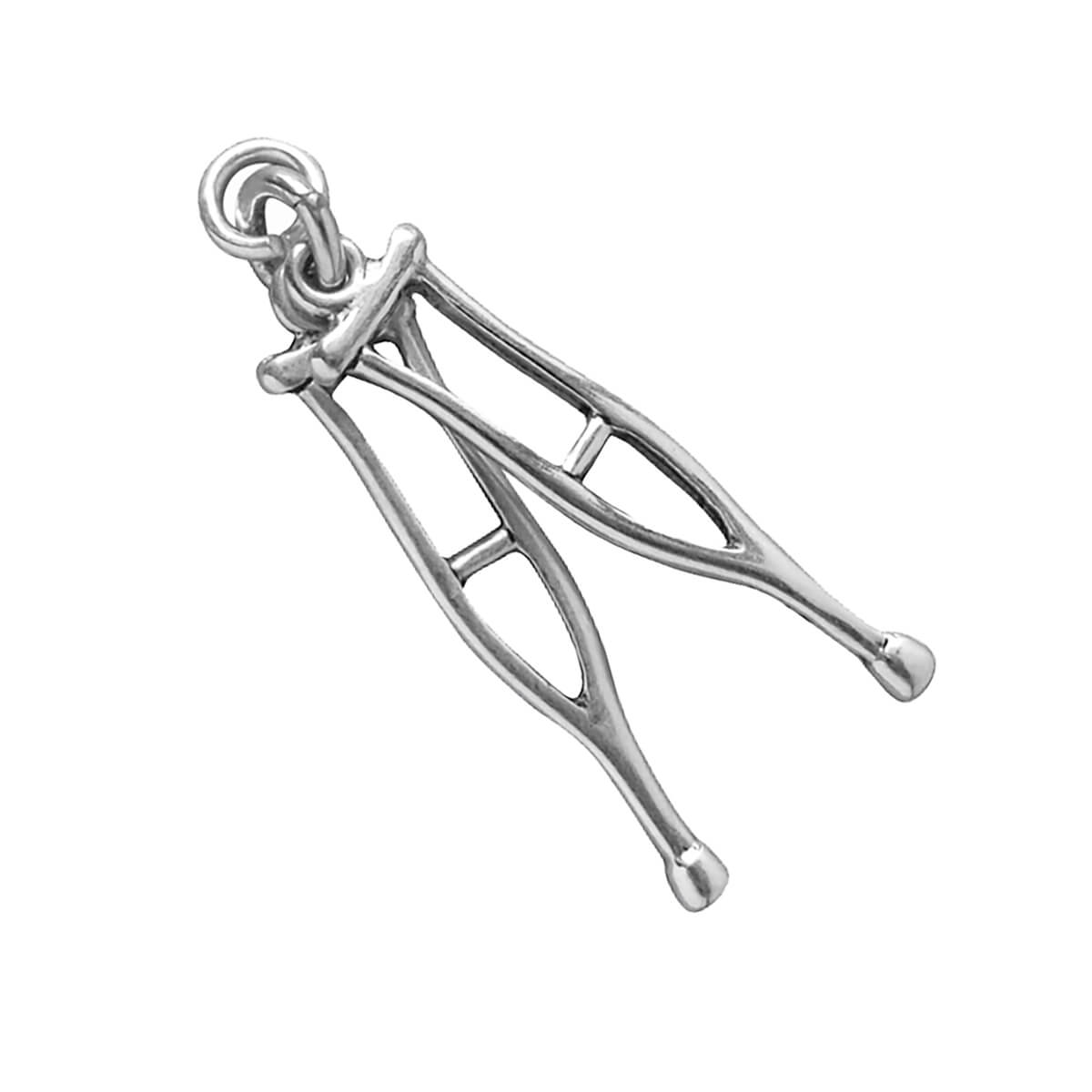 Sterling silver crutches charm on a white background