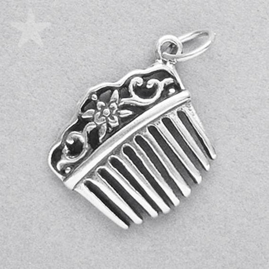 silver hair comb charm on a grey background