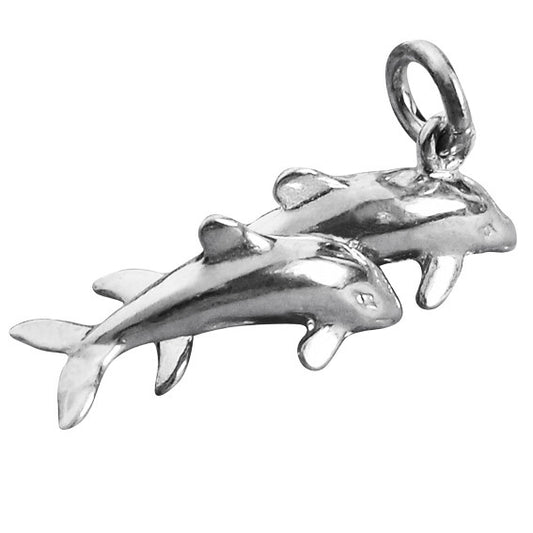 Sterling silver dolphins charm on a white background