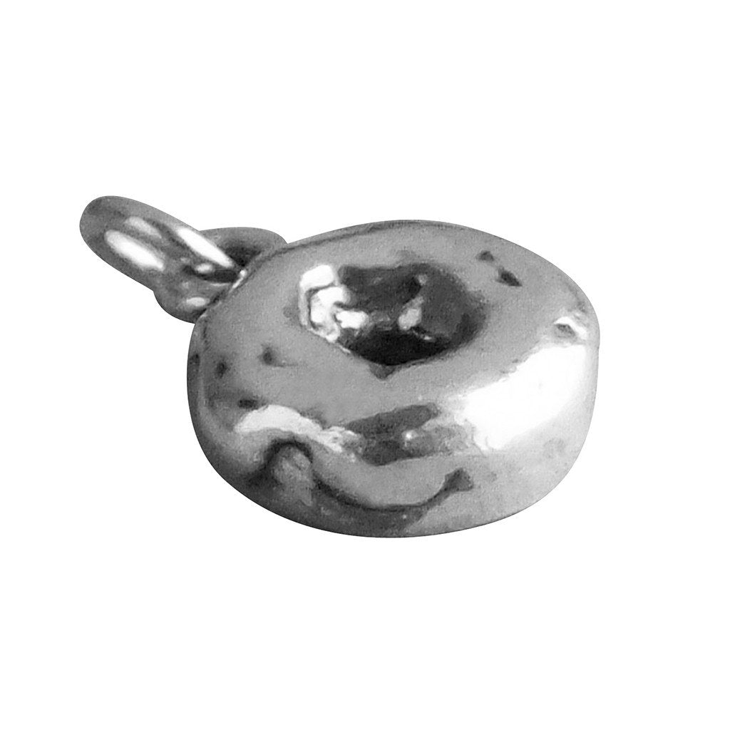 Sterling silver donut charm on a white background