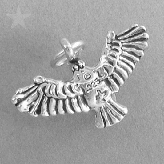 silver eagle charm with outstretched wings, viewed from back, on grey background