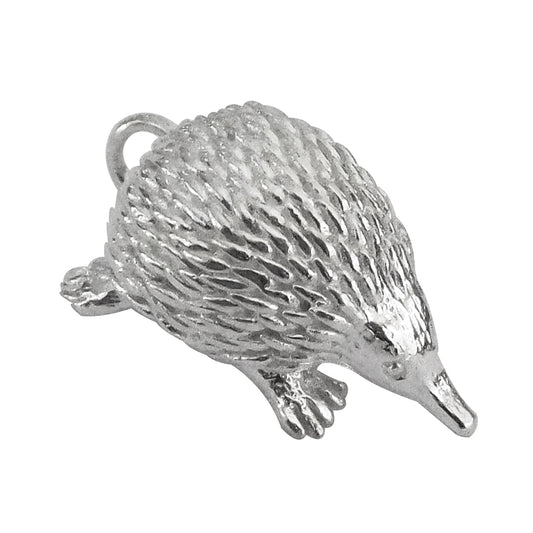 Sterling silver Australian echidna charm on a white background