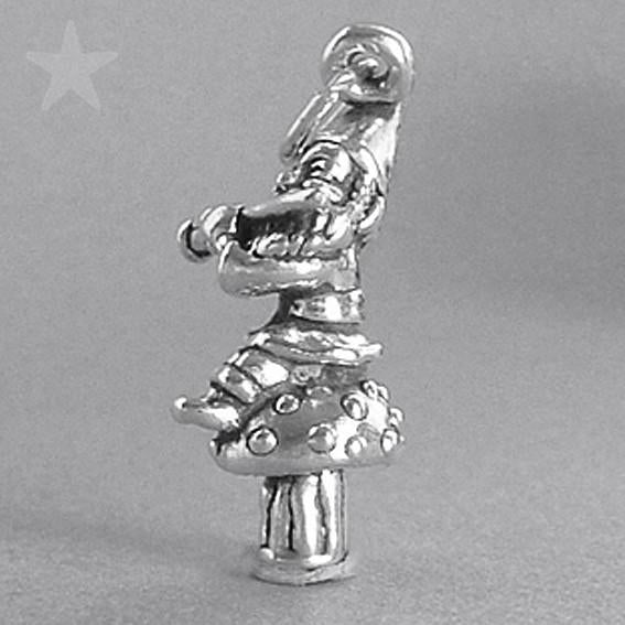 Sterling silver flute playing elf charm on a grey background