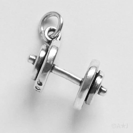 silver hand weight charm on grey background