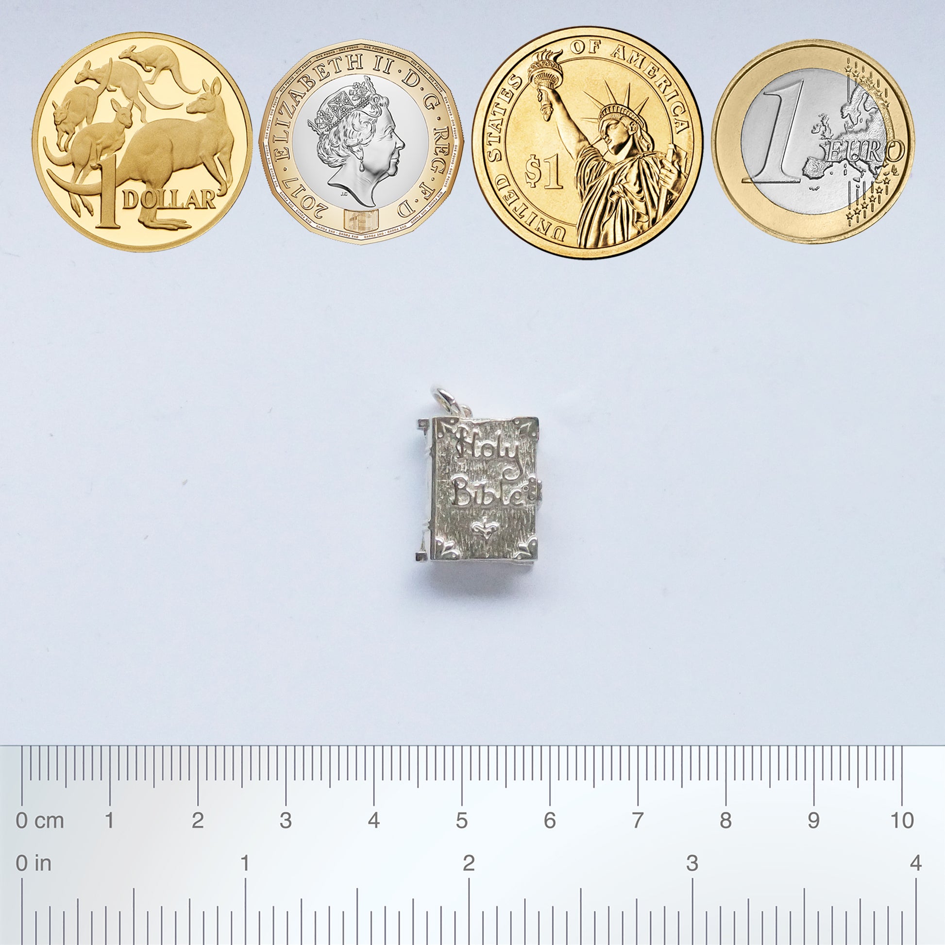Charmarama Size Guide with coins and rulers for scale