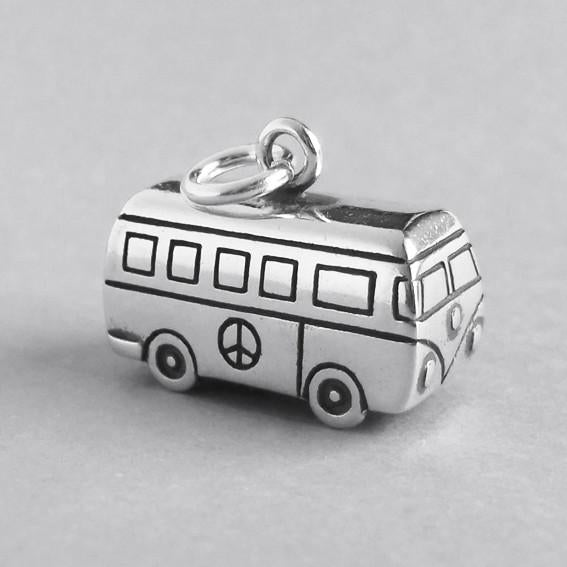 silver kombi charm on grey background