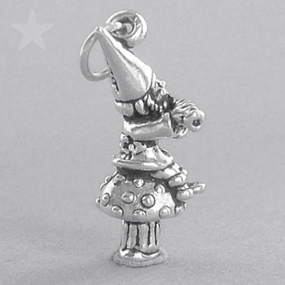 Sterling silver elf charm on a grey background