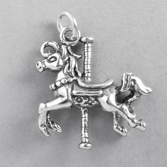 silver carousel horse charm on grey background