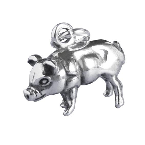 Sterling silver pig charm on white background