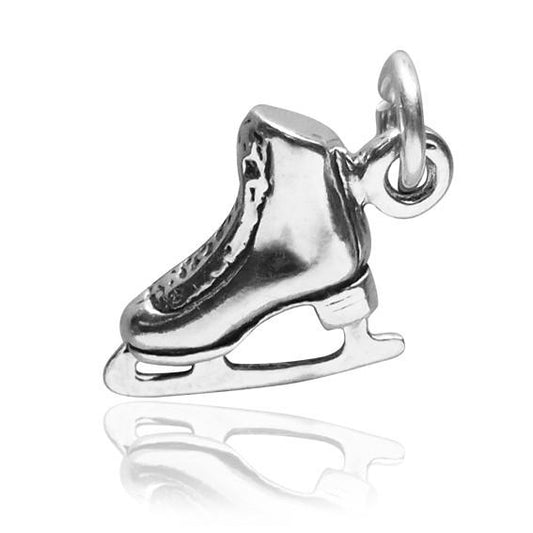 Ice skate charm in sterling silver on white background